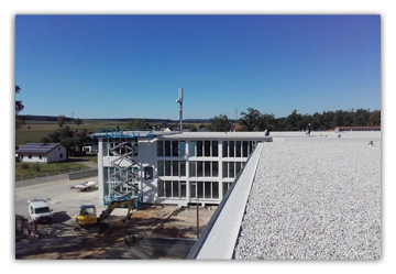 Verblechung Hauskante Attika mit Kranausleger